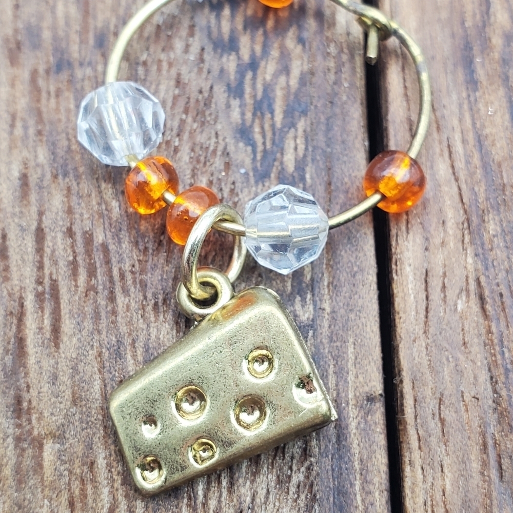 The big cheese orange crystal charm pendant